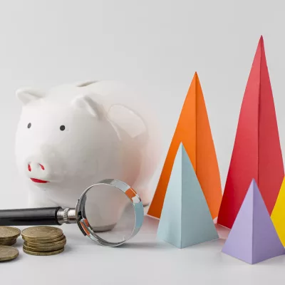 multicolored-growth-cones-with-coins-piggy-bank